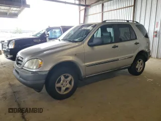 1998 Mercedes-Benz M 320/430/500 with VIN 4JGAB54EXWA050713, listed as a Copart auction lot 62319435 with 97,610 mi miles and Clean title. Bid and sale history available at DreamBid. Image 1.