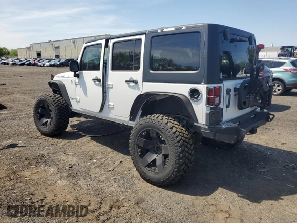 2013 Jeep Wrangler Unlimited Rubicon with VIN 1C4HJWFG2DL549064, listed as a Copart auction lot 56474055 with 148,217 mi miles and Salvage title. Bid and sale history available at DreamBid. Image 2.