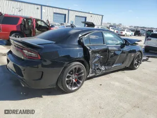 2022 Dodge Charger Scat Pack with VIN 2C3CDXGJXNH180037, listed as a Copart auction lot 77573324 with 15,583 mi miles and Salvage Title. Bid and sale history available at carsss.com. Image 3.