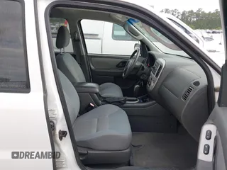 2006 Ford Escape XLT with VIN 1FMYU93196KC72975, listed as a IAAI auction lot 42088686 with 75,440 mi miles and . Bid and sale history available at DreamBid. Image 5.