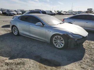 2016 Tesla Model S 90D с VIN 5YJSA1E27GF150737, выставлен на аукционе Copart как лот 53814915 с пробегом Не указан миль и Списание • Salvage title. История ставок и продаж доступна на DreamBid. Изображение 4.