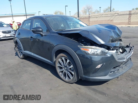 2019 Mazda CX-3 Touring with VIN JM1DKDC7XK1406974, listed as a IAAI auction lot 42047455 with 68,313 mi miles. Bid and sale history available at carsss.com. Image 1.