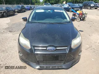 2014 Ford Focus Titanium with VIN 1FADP3N27EL251229, listed as a Copart auction lot 62201195 with 75,534 mi miles and Salvage title. Bid and sale history available at DreamBid. Image 5.