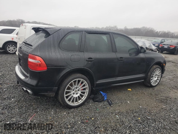 2009 Porsche Cayenne Turbo with VIN WP1AC29P69LA83418, listed as a Copart auction lot 87115384 with 129,437 mi miles and Clean Title. Bid and sale history available at carsss.com. Image 3.