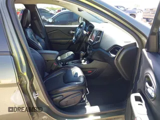 2019 Jeep Cherokee Trailhawk Elite with VIN 1C4PJMBN7KD287506, listed as a IAAI auction lot 42072589 with 108,034 mi miles and . Bid and sale history available at DreamBid. Image 5.