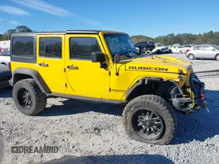 2015 Jeep Wrangler Unlimited Rubicon z VIN 1C4BJWFG4FL681946, wystawiony jako IAAI lot #40809597 z przebiegiem 57 148 mil mil oraz . Historia ofert i sprzedaży dostępna na DreamBid. Obrazek 13.