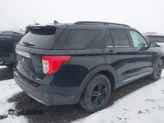 2021 Ford Explorer XLT with VIN 1FMSK8DH0MGA59737, listed as a IAAI auction lot 41474554 with 74,536 mi miles. Bid and sale history available at carsss.com. Image 4.