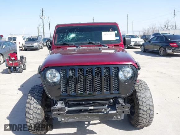 2021 Jeep Gladiator Willys z VIN 1C6HJTAG0ML536455, wystawiony jako IAAI lot #41702393 z przebiegiem 90 644 mil mil oraz . Historia ofert i sprzedaży dostępna na DreamBid. Obrazek 6.