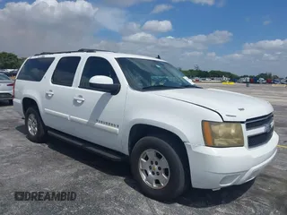 2009 Chevrolet Suburban LT w/2LT with VIN 1GNFC26JX9J108623, listed as a IAAI auction lot 42115456 with 144,370 mi miles. Bid and sale history available at carsss.com. Image 1.