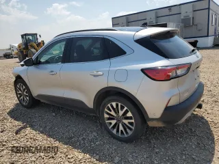 2020 Ford Escape Titanium with VIN 1FMCU9J98LUA78182, listed as a Copart auction lot 60477635 with 76,117 mi miles and Salvage title. Bid and sale history available at DreamBid. Image 2.