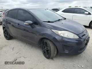 2013 Ford Fiesta SE with VIN 3FADP4EJ6DM165145, listed as a Copart auction lot 50395685 with 71,505 mi miles and Salvage Title. Bid and sale history available at DreamBid. Image 4.