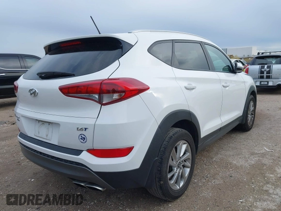 2016 Hyundai Tucson Sport with VIN KM8J33A2XGU242256, listed as a IAAI auction lot 41065573 with 97,503 mi miles. Bid and sale history available at carsss.com. Image 4.