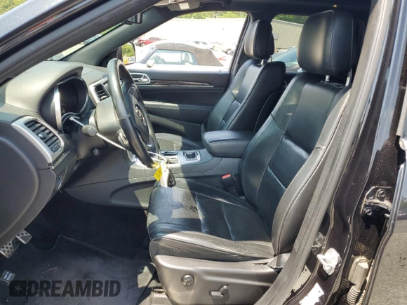 2016 Jeep Grand Cherokee Overland z VIN 1C4RJFCG5GC343864, wystawiony jako Copart lot #60892615 z przebiegiem 97 133 mil mil oraz Szkoda całkowita • Salvage title. Historia ofert i sprzedaży dostępna na DreamBid. Obrazek 7.
