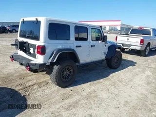 2022 Jeep Wrangler Unlimited Rubicon z VIN 1C4JJXFGXNW121489, wystawiony jako IAAI lot #41749550 z przebiegiem 56 601 mil mil oraz . Historia ofert i sprzedaży dostępna na DreamBid. Obrazek 4.