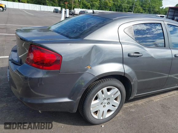 2014 Dodge Avenger SE with VIN 1C3CDZAB3EN219717, listed as a IAAI auction lot 42737543 with 157,362 mi miles and . Bid and sale history available at DreamBid. Image 6.