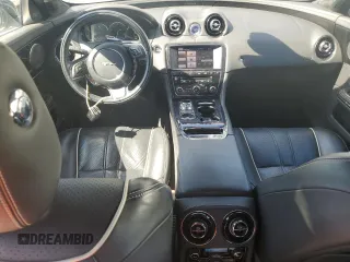 2013 Jaguar XJ Portfolio with VIN SAJWJ2GDXD8V45921, listed as a Copart auction lot 49289825 with 115,152 mi miles and Salvage title. Bid and sale history available at DreamBid. Image 8.