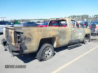 2014 Chevrolet Silverado 1500 Work Truck with VIN 1GCNCPEH0EZ272958, listed as a IAAI auction lot 41801400 with 130,363 mi miles and . Bid and sale history available at DreamBid. Image 4.