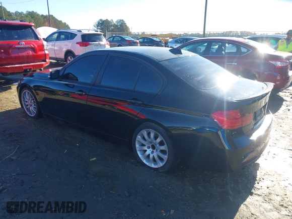 2013 BMW 3 Series 328i with VIN WBA3A5G5XDNP25605, listed as a IAAI auction lot 40854040 with 155,511 mi miles. Bid and sale history available at carsss.com. Image 3.