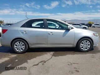 2010 Kia Forte EX with VIN KNAFU4A29A5195670, listed as a IAAI auction lot 42075961 with 160,648 mi miles. Bid and sale history available at carsss.com. Image 13.