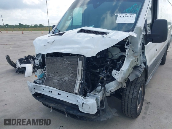 2023 Ford Transit Cargo z VIN 1FTLW3X86PKC12960, wystawiony jako IAAI lot #42174156 z przebiegiem 23 420 mil mil oraz . Historia ofert i sprzedaży dostępna na DreamBid. Obrazek 6.