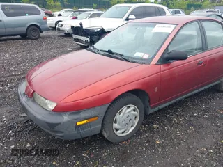 1997 Saturn SL with VIN 1G8ZF5289VZ138039, listed as a IAAI auction lot 39432871 with 125,022 mi miles. Bid and sale history available at carsss.com. Image 6.