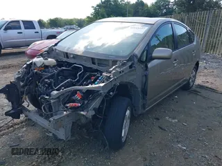 2004 Toyota Prius z VIN JTDKB22U040116044, wystawiony jako IAAI lot #42533237 z przebiegiem Nie podano mil oraz . Historia ofert i sprzedaży dostępna na DreamBid. Obrazek 2.