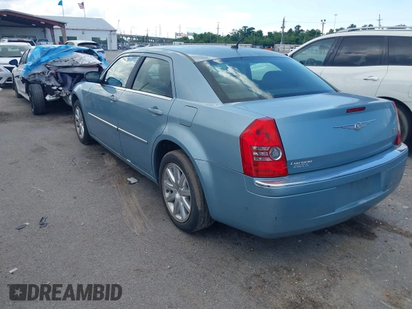 2008 Chrysler 300 Limited with VIN 2C3KA33G98H267617, listed as a IAAI auction lot 42256596 with 391,552 mi miles and . Bid and sale history available at DreamBid. Image 3.