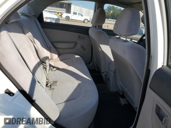 2009 Kia Spectra LX with VIN KNAFE221295606992, listed as a Copart auction lot 72767494 with 163,041 mi miles and Salvage Title. Bid and sale history available at carsss.com. Image 10.