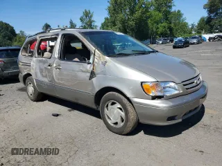 2002 Toyota Sienna LE with VIN 4T3ZF13C32U463654, listed as a Copart auction lot 68852404 with 199,094 mi miles and Salvage Title. Bid and sale history available at carsss.com. Image 4.