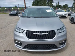 2021 Chrysler Pacifica Touring L with VIN 2C4RC1BG3MR552828, listed as a IAAI auction lot 42207838 with 67,917 mi miles and . Bid and sale history available at DreamBid. Image 12.