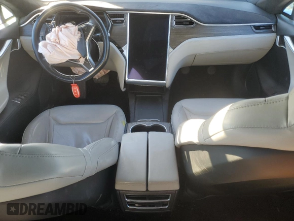 2016 Tesla Model S 90D with VIN 5YJSA1E26GF147974, listed as a Copart auction lot 82815404 with 126,609 mi miles and Salvage Title. Bid and sale history available at DreamBid. Image 8.