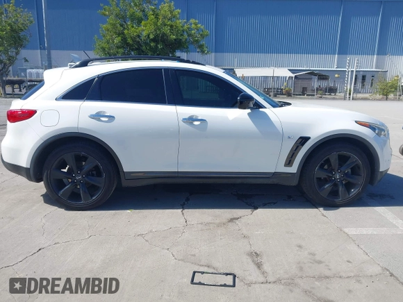 2015 Infiniti QX70 with VIN JN8CS1MU5FM380792, listed as a IAAI auction lot 41946084 with 128,928 mi miles and . Bid and sale history available at DreamBid. Image 13.