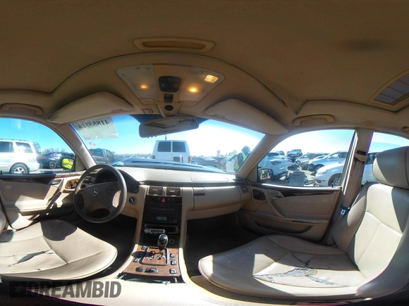 2001 Mercedes-Benz E-Class with VIN WDBJF65J11B368277, listed as a IAAI auction lot 41855716 with 207,864 mi miles. Bid and sale history available at carsss.com. Image 18.