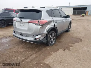 2016 Toyota RAV4 XLE with VIN 2T3WFREV4GW270548, listed as a IAAI auction lot 41699126 with 100,905 mi miles. Bid and sale history available at carsss.com. Image 4.