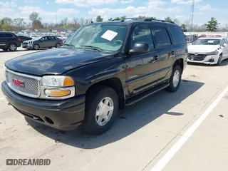 2004 GMC Yukon Denali with VIN 1GKEK63U54J308934, listed as a IAAI auction lot 42124676 with 254,362 mi miles. Bid and sale history available at carsss.com. Image 2.