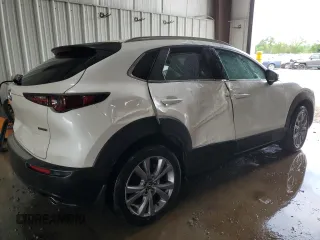 2023 Mazda CX-30 S Select z VIN 3MVDMBBM2PM521471, wystawiony jako Copart lot #63272965 z przebiegiem 26 879 mil mil oraz Szkoda całkowita • Salvage title. Historia ofert i sprzedaży dostępna na DreamBid. Obrazek 3.