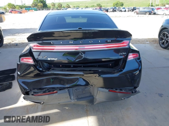 2014 Lincoln MKZ Hybrid z VIN 3LN6L2LU5ER831041, wystawiony jako IAAI lot #42447895 z przebiegiem 92 102 mil mil oraz . Historia ofert i sprzedaży dostępna na DreamBid. Obrazek 16.