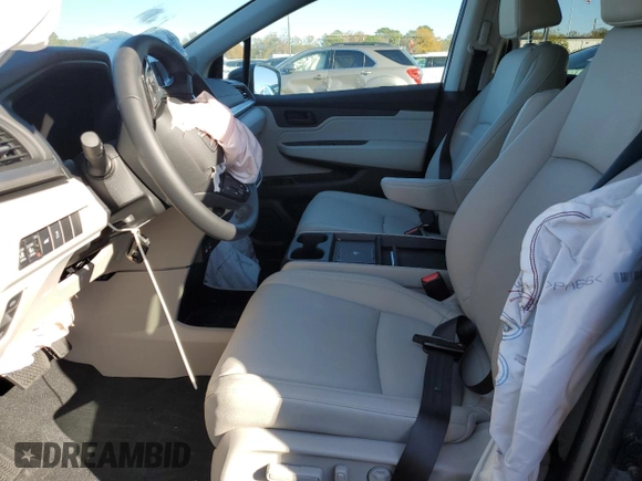 2025 Honda Odyssey EX-L with VIN 5FNRL6H68SB010600, listed as a Copart auction lot 84069294 with Not Provided miles and Salvage Title. Bid and sale history available at carsss.com. Image 7.