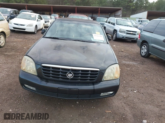 2002 Cadillac DeVille DTS with VIN 1G6KF57992U219921, listed as a IAAI auction lot 41261360 with 127,710 mi miles. Bid and sale history available at carsss.com. Image 6.