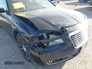 2013 Chrysler 300 with VIN 2C3CCABG7DH573164, listed as a IAAI auction lot 41851066 with 218,234 mi miles. Bid and sale history available at carsss.com. Image 6.