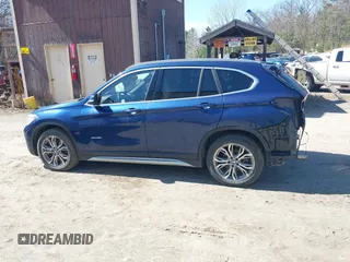 2017 BMW X1 xDrive28i with VIN WBXHT3C33H5F82035, listed as a IAAI auction lot 41944399 with 102,942 mi miles. Bid and sale history available at carsss.com. Image 14.