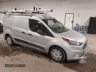 2023 Ford Transit Connect XLT with VIN NM0LS7T22P1557989, listed as a IAAI auction lot 41606146 with 6,554 mi miles and . Bid and sale history available at DreamBid. Image 1.