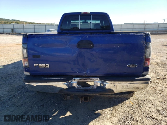 2003 Ford F-350 XL with VIN 1FTWW33P43EB78603, listed as a Copart auction lot 76317284 with 228,798 mi miles and Salvage Title. Bid and sale history available at DreamBid. Image 6.