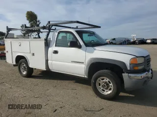 2005 GMC Sierra 1500 with VIN 1GDHC24U65E138733, listed as a Copart auction lot 47315715 with 303,907 mi miles and Salvage Title. Bid and sale history available at DreamBid. Image 4.