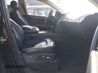 2014 Audi Q7 3.0T Premium with VIN WA1CGAFE2ED010007, listed as a IAAI auction lot 41751305 with 120,524 mi miles. Bid and sale history available at carsss.com. Image 5.