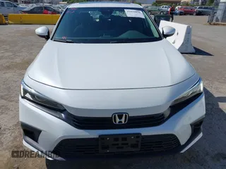 2024 Honda Civic EX z VIN 2HGFE1F74RH304237, wystawiony jako IAAI lot #42175076 z przebiegiem 24 618 mil mil oraz . Historia ofert i sprzedaży dostępna na DreamBid. Obrazek 13.