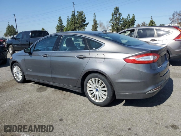 2013 Ford Fusion SE Hybrid z VIN 3FA6P0LU0DR274279, wystawiony jako Copart lot #57462315 z przebiegiem 272 825 mil mil oraz Szkoda całkowita • Salvage title. Historia ofert i sprzedaży dostępna na DreamBid. Obrazek 2.
