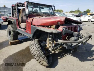 1999 Jeep Wrangler Sport with VIN 1J4FY19S5XP493117, listed as a Copart auction lot 57490792 with Not provided miles and Salvage title. Bid and sale history available at DreamBid. Image 1.