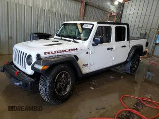 2021 Jeep Gladiator Rubicon с VIN 1C6JJTBG8ML527146, выставлен на аукционе Copart как лот 55036755 с пробегом 77 695 миль миль и Списание • Salvage title. История ставок и продаж доступна на DreamBid. Изображение 1.