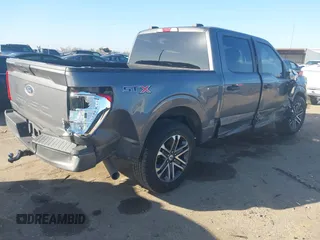 2021 Ford F-150 XL with VIN 1FTEW1C56MFA89903, listed as a IAAI auction lot 41657308 with 105,626 mi miles. Bid and sale history available at carsss.com. Image 4.